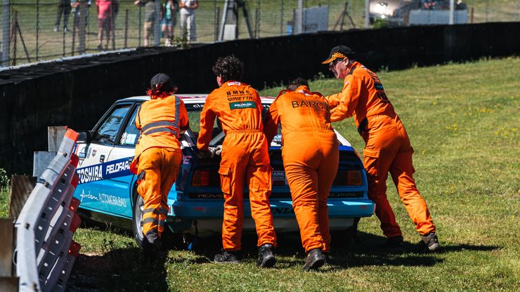 Marshals pushing a car