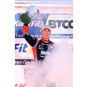 Dan Lloyd lifting a trophy