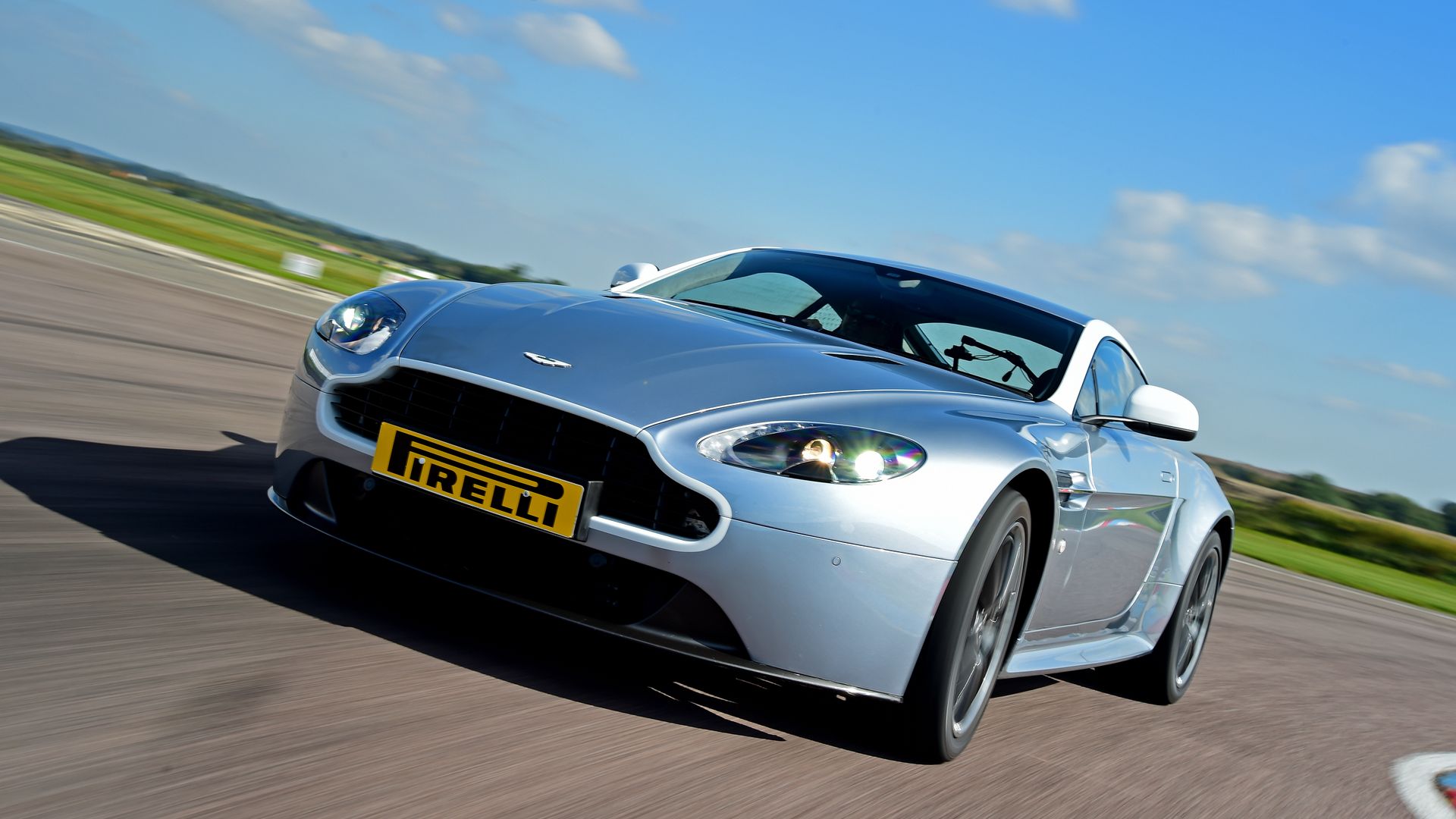 Aston Martin racing around Thruxton circuit