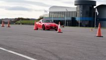 Junior driver driving a Mazda MX-5