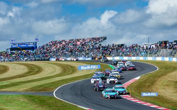 Tom Ingram extends BTCC points lead at Donington Park.