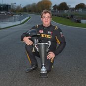 Stuart Oliver with helmet in hands