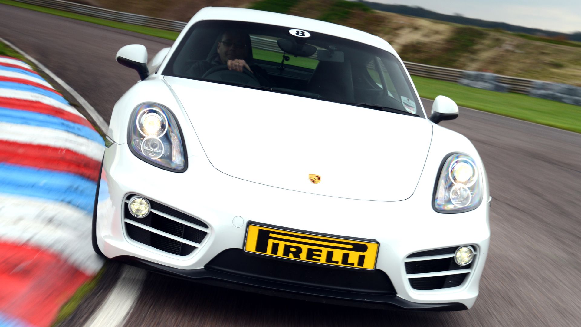 White Porsche Cayman