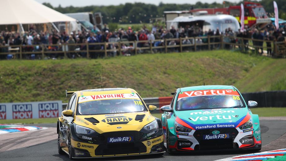 Ash Sutton and Tom Ingram side by side into the chicane.