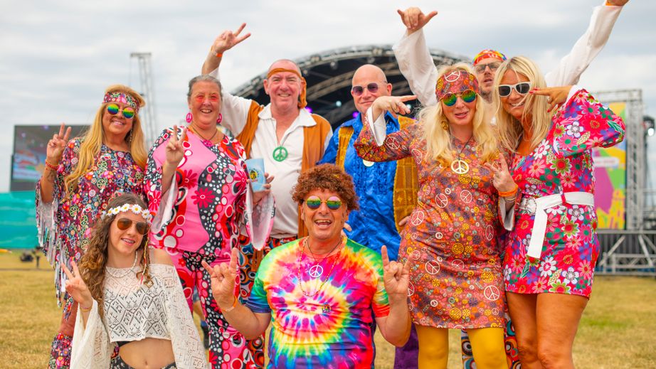 Fans dressed up in 70's outfits