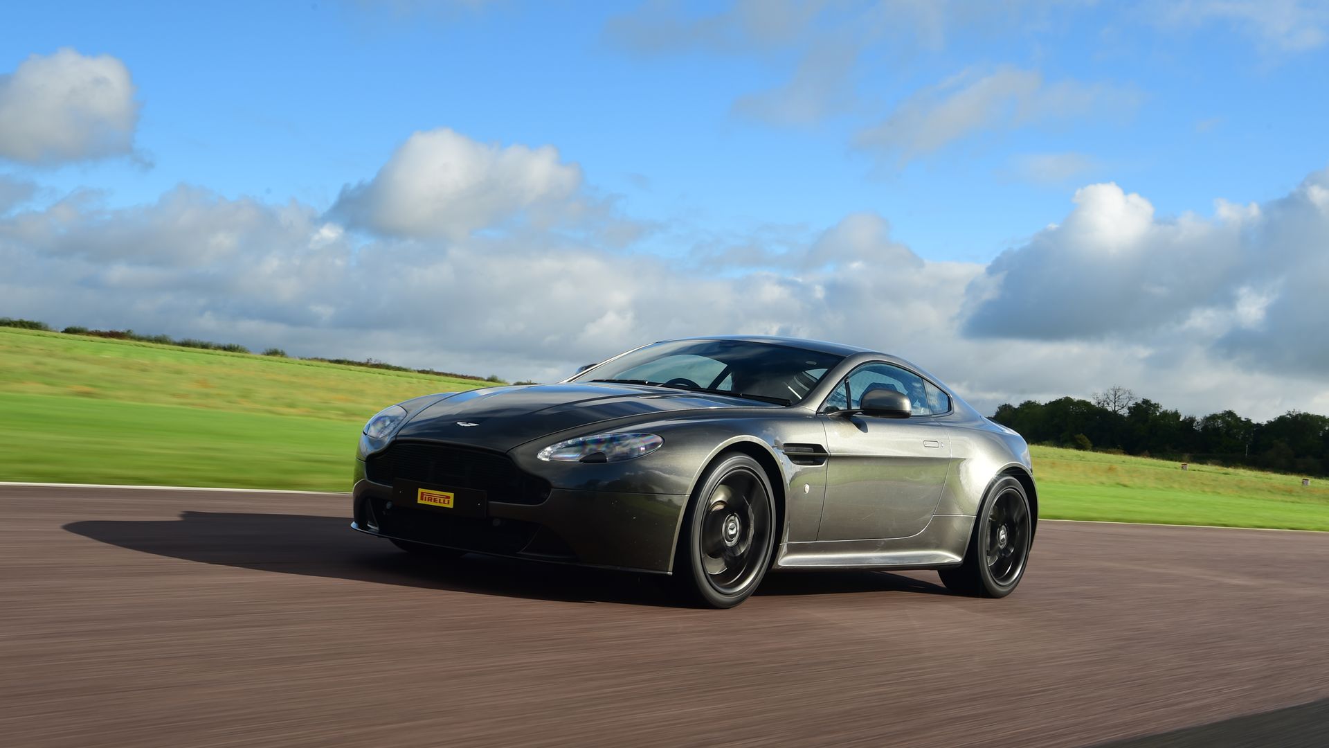 Aston Martin racing around Thruxton circuit