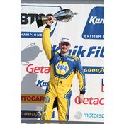 Ash Sutton lifting a trophy