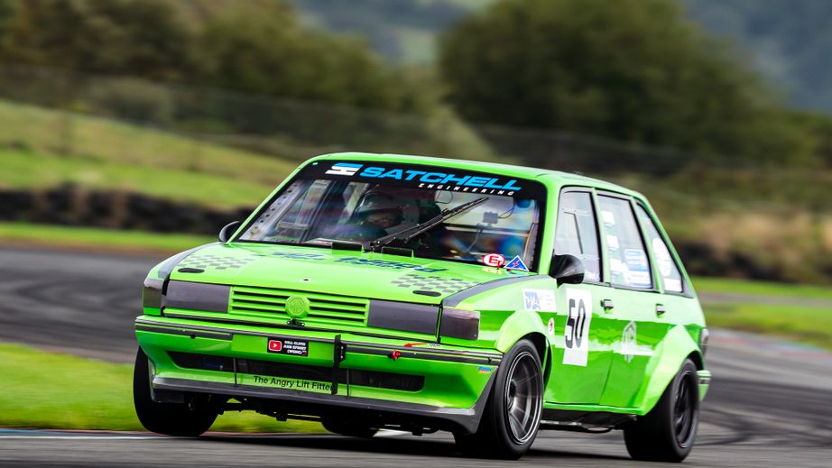 Green car on track at Pembrey