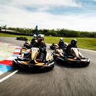Group of people on the kart centre track