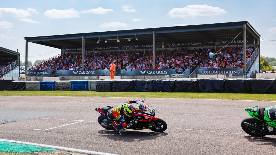 BSB rider leaning over through a corner