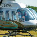 Customers experiencing a helicopter ride